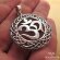 Ohm Symbol Encircled With a Never Ending Celtic Knots Round Pendant in 925 Silver